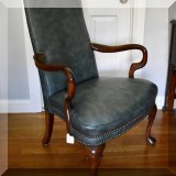 F27. Statesville blue leather desk chair with nailhead trim. 42”h x 27”w x 20”d - $185